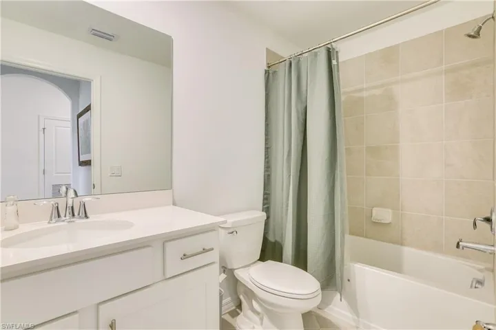 Full bathroom with vanity and shower / tub combo
