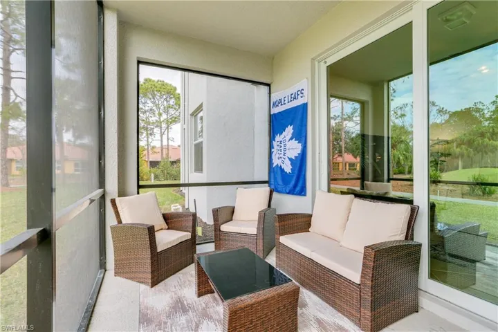 Sunroom featuring an outdoor hangout area