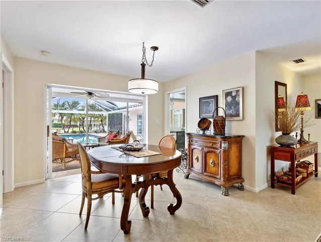 Dining Area with telescoping sliders to the Lanai
