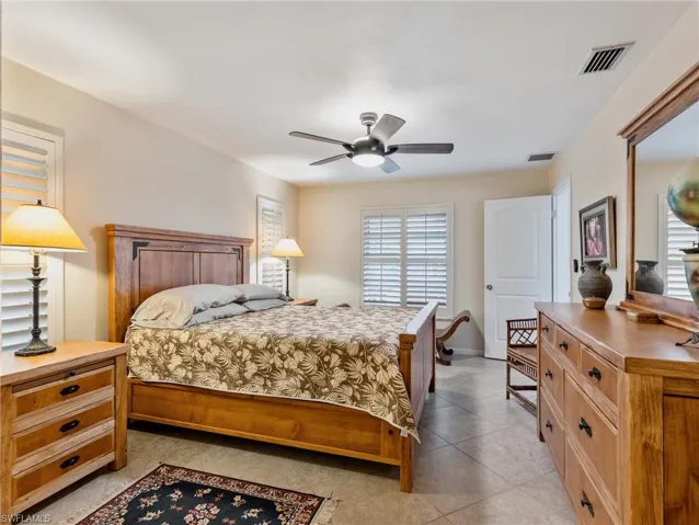 Primary Bedroom features 2 closets, one is a walk-in