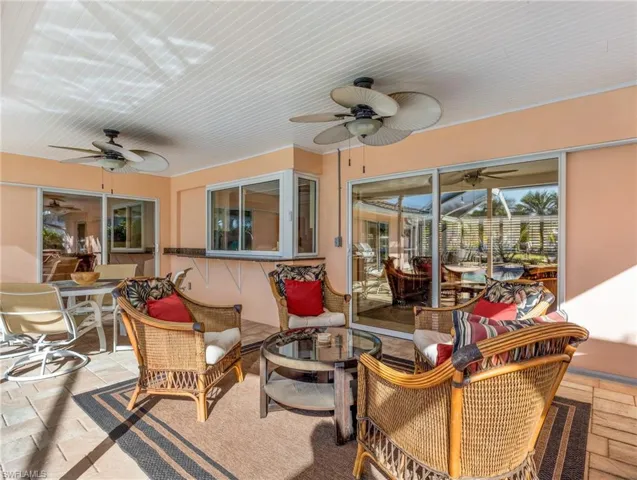 Plenty of room to entertain on the Lanai plus a pass-thru from the Kitchen