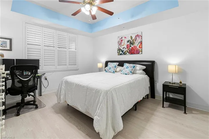 ANOTHER GREAT VIEW OF ALL THE UPDATES IN THIS MASTER BEDROOM LIKE THE AMAZING FLOORING & THE PLANTATION SHUTTERS THAT MAKES THIS HOME SO SPECIAL!