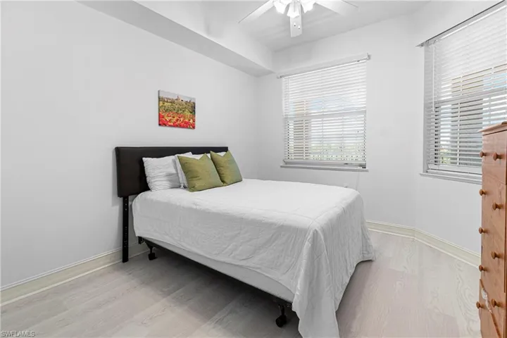 LARGE GUEST BEDROOM ALSO WITH LUXURY VINYL PLANK FLOORING & LIKE THE MASTER WAS FRESHLY PAINTED IN 2024.