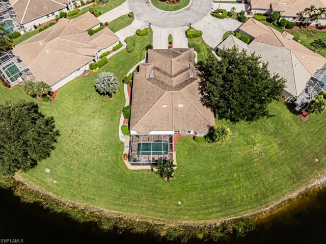Aerial view of residential area with a large body of water