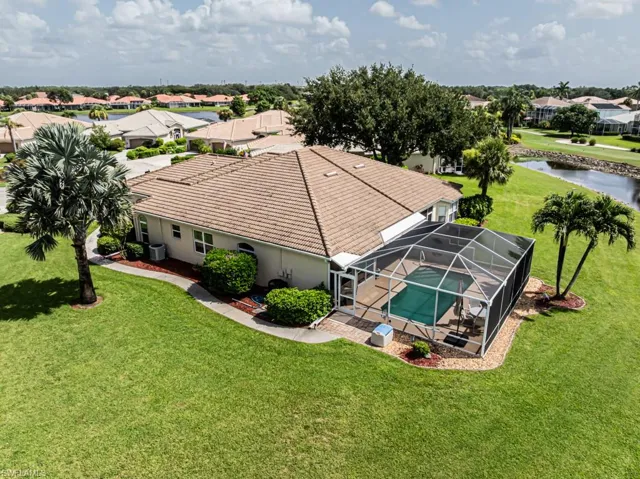 Aerial view of residential area with a nearby body of water