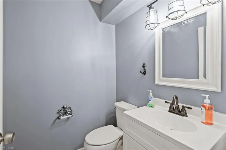 Bathroom featuring toilet and vanity