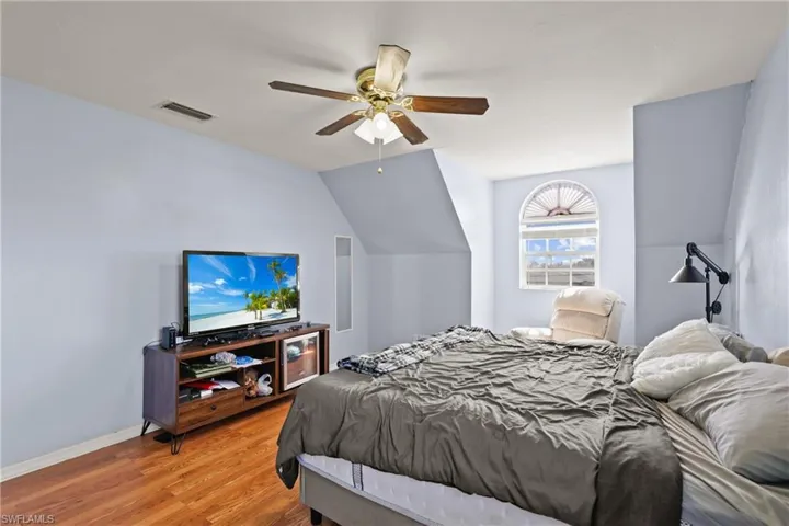 Bedroom featuring light wood-style flooring and a ceiling fan