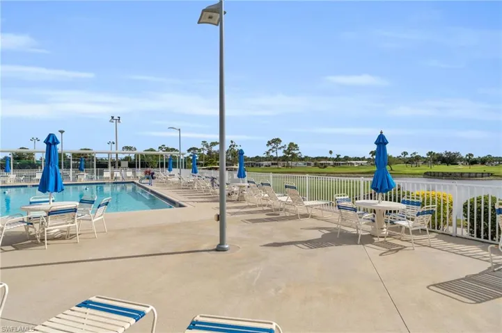 View of swimming pool with golf course views