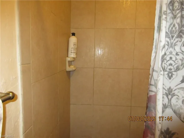 Bathroom view of tiled shower