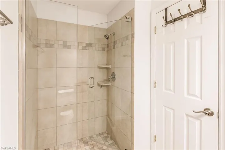 Bathroom featuring walk in shower