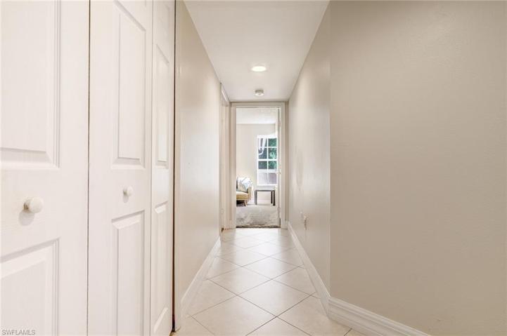 Hall from laundry facing guest room and guest bath