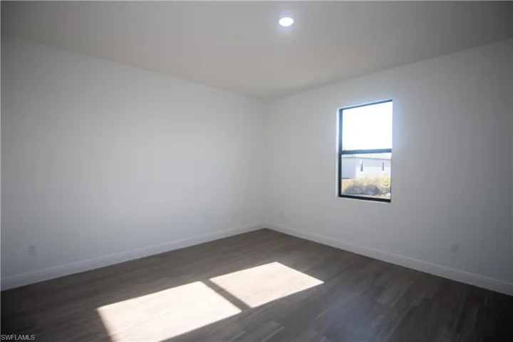 Master bedroom featuring vinyl-type flooring