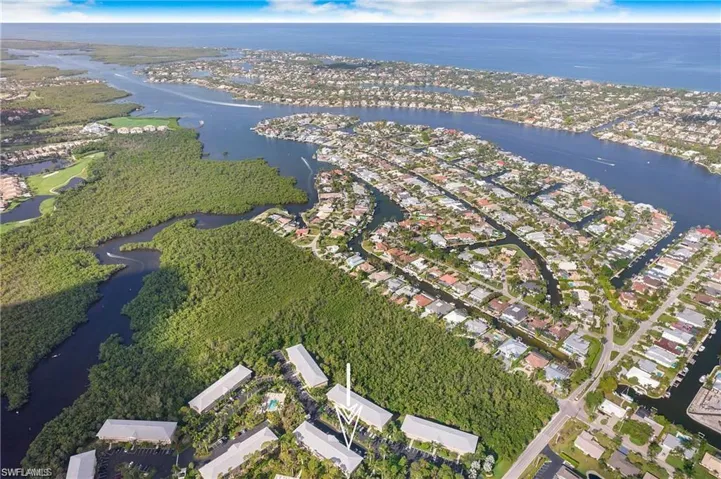 Aerial view with a residential view and a water view
