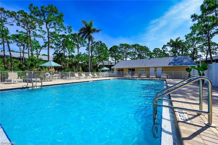 Pool featuring fence