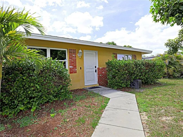 View of front of home with a front lawn