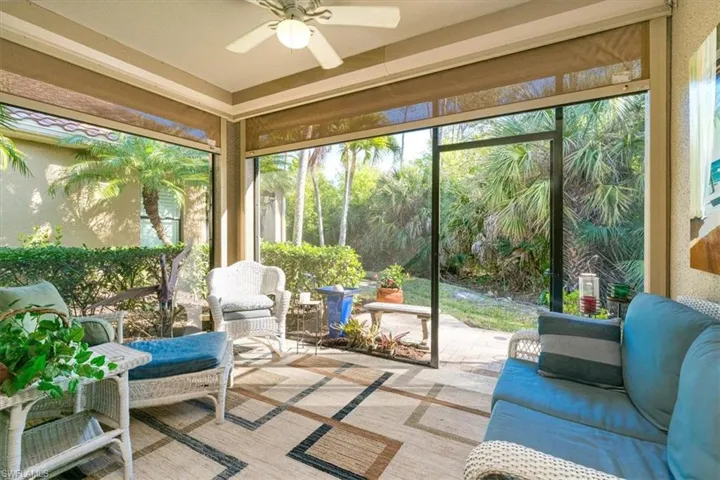 Sunroom with view of preserve