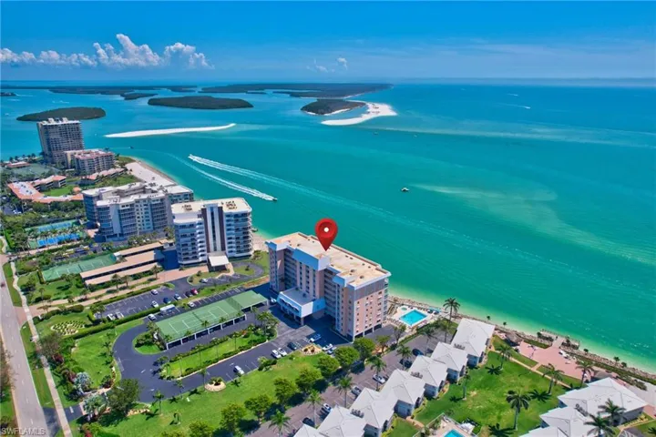 Aerial view with a city view and a water view