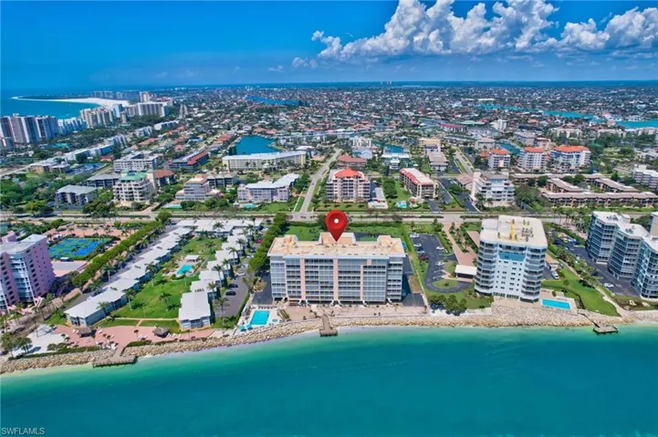Drone / aerial view with a view of city and a water view