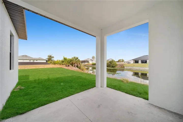 View of patio with a water view and a residential view