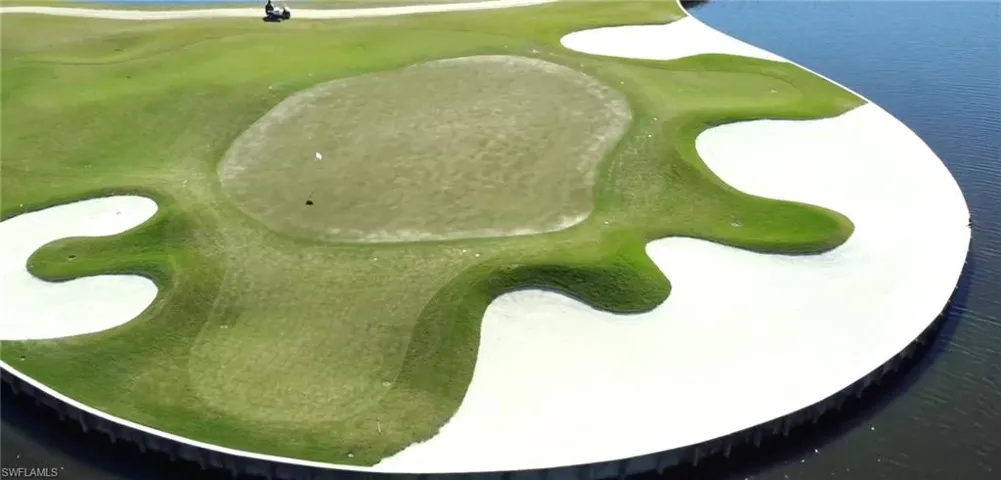View of property's community featuring a sink and view of golf course