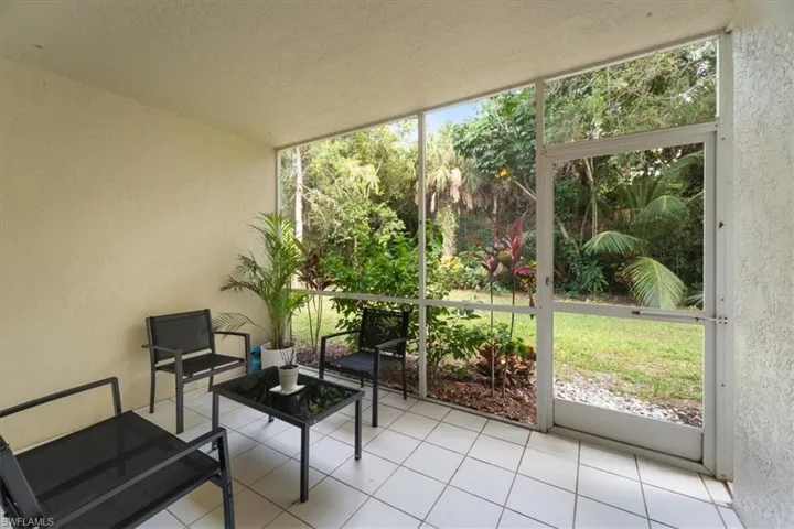 Sunroom / solarium featuring outdoor lounge area
