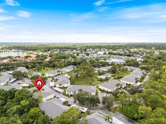 View of property location with nearby suburban area