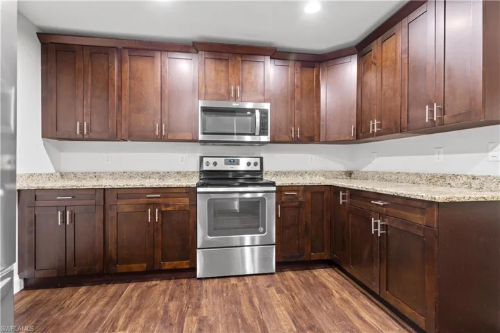 Kitchen Area with Lots of Wood Cabinets