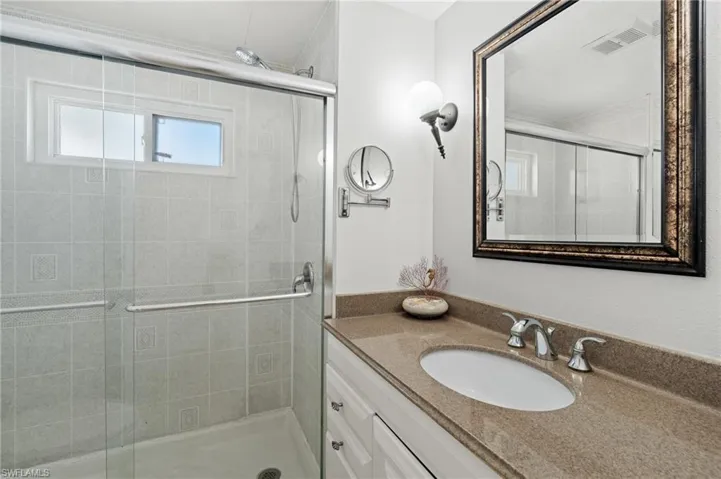 Master bath with vanity and walk-in shower
