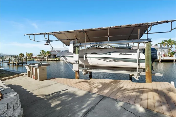 Dock area with covered boat lift