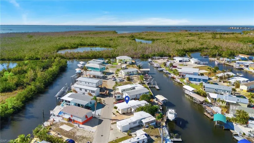 Aerial view with a water view facing east