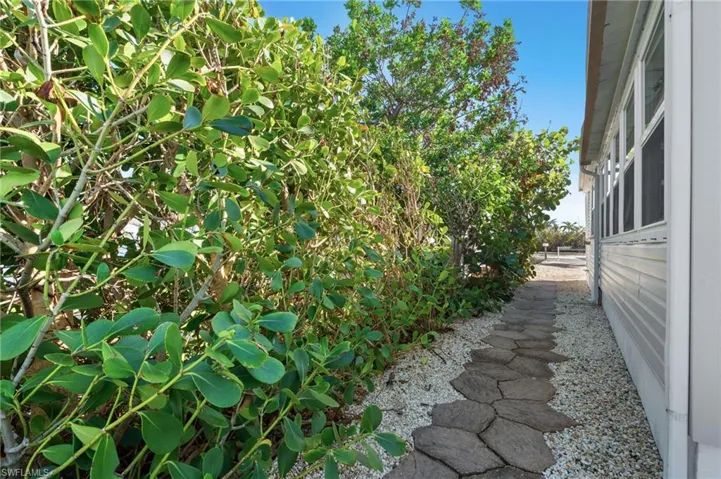 Walkway pavers along side of property.