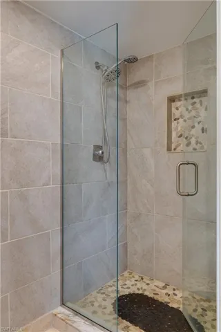 Primary Bathroom featuring a shower stall