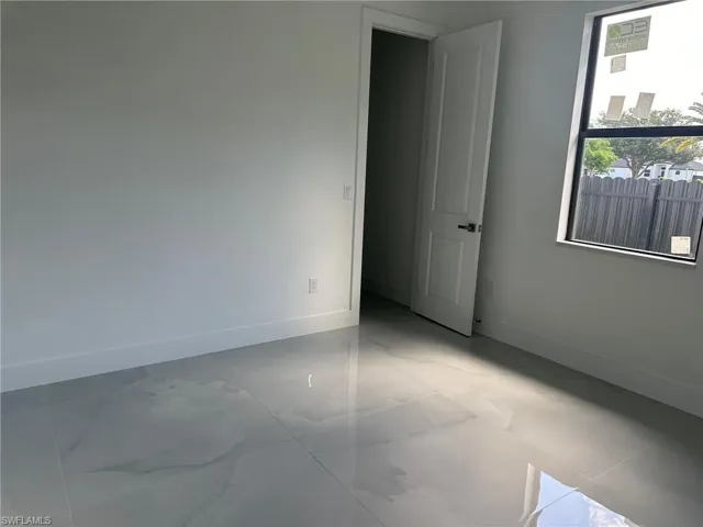 View of tiled spare room