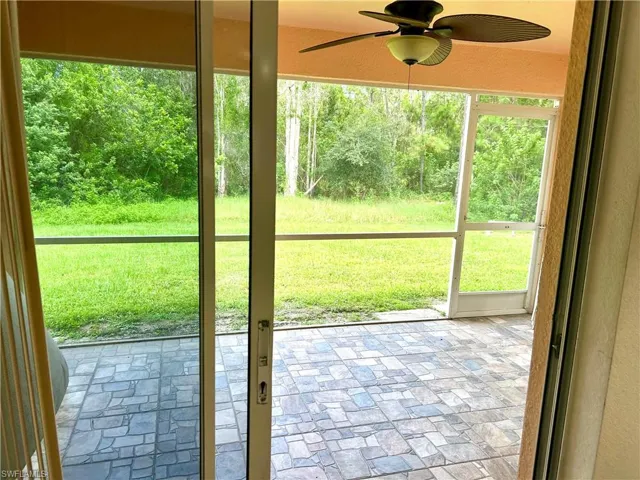 Entryway featuring a ceiling fan