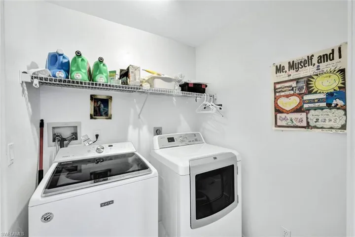 Utility Room that has a door to the garage, you walk through this laundry room to get to the garage.