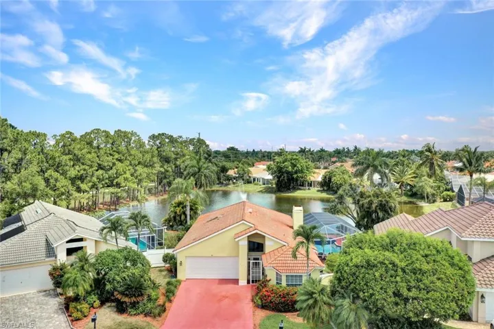 View of front of home with a water view