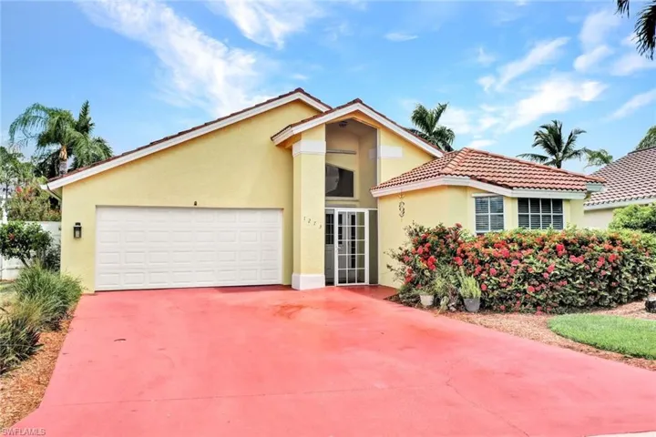 View of front of home featuring a garage