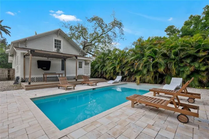 Outdoor pool with a patio
