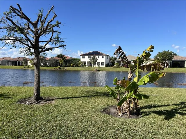Water view featuring nearby suburban area