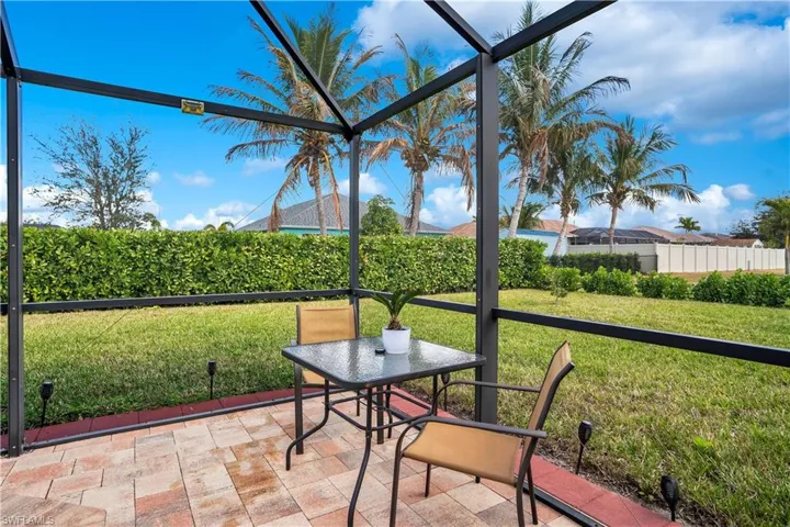 Sunroom featuring outdoor dining space