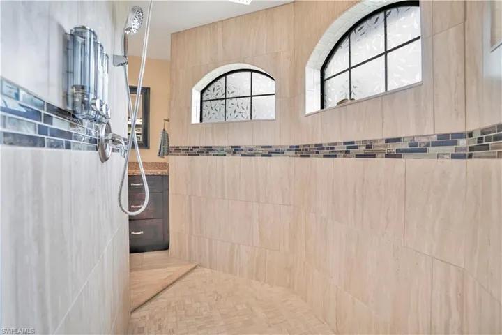 Bathroom with a walk in shower and vanity