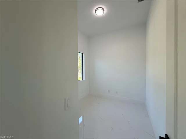 Spare room with baseboards