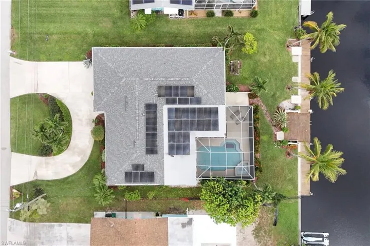 Birds eye view of property featuring 40 solar panels !!!
