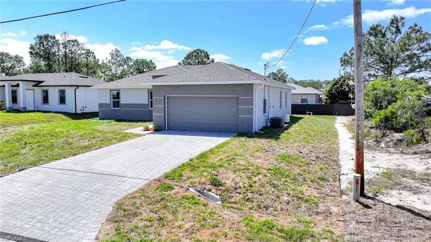 Lovely Brand New 3 Bedroom With Home Office/2 Bathroom/2 Car Garage Home In Lehigh Acres!