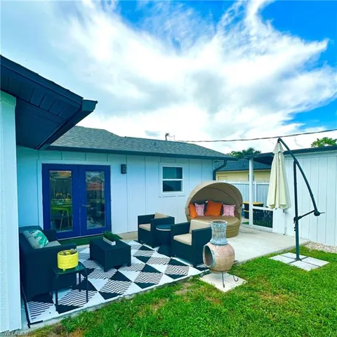 Large Concrete Patio, Perfect for Relaxation or Entertaining.