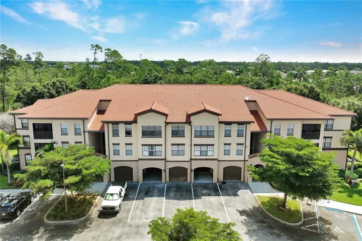 Multi-story building featuring a tile roof