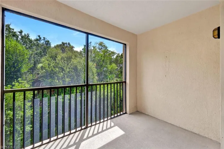 Screened-in lanai with an east-facing preserve view