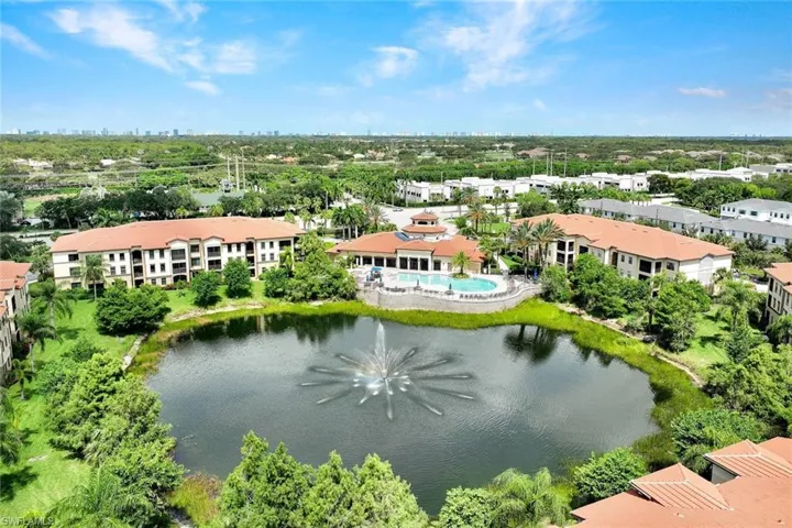 Beautiful community with a large lake and fountain behind the clubhouse and community pool