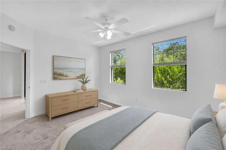 AI Staged. Large bedroom with preserve eastern view