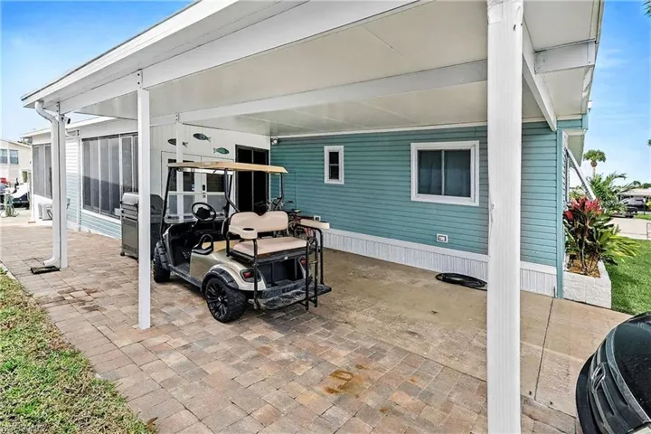 Carport and side walk to rear